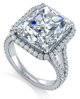 Emerald cut 7 carat micro pave lab created cubic zirconia halo engagement ring in platinum.