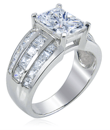 Emerald cut lab grown diamond alternative cubic zirconia 4 carat three row princess cut channel set ring in platinum.