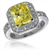 Emerald radiant cut 4 carat lab grown diamond quality cubic zirconia halo engraved ring in 14k white gold.