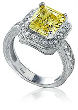 Emerald radiant cut 4 carat lab created cubic zirconia halo engraved ring in platinum.