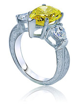 Pear 5 carat and heart lab grown diamond alternative cubic zirconia three stone antique estate ring in platinum.