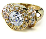 Bellagia 2 carat round lab grown diamond simulant cubic zirconia bezel and pave set engagement ring in 14k yellow gold.