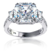 Muzeum 5.5 carat asscher cut lab grown cubic zirconia trapezoid and round ring in 14k gold.