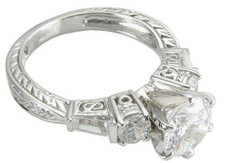 Bento 1.5 carat round and baguette lab grown diamond quality cubic zirconia engraved antique ring in 14k white gold.