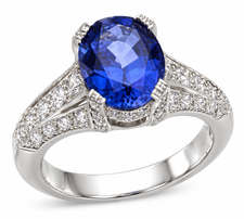 Pacifica lab grown diamond look cubic zirconia pave and 2.5 carat oval man made sapphire ring in 14k white gold.