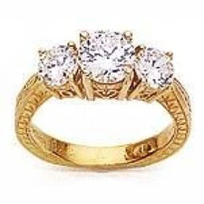 Vintage 1 carat round center lab grown diamond quality cubic zirconia engraved three stone ring in 14k or 18k yellow gold.