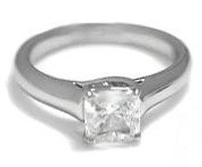 Trellis criss cross 1 carat princess cut  lab grown diamond look cubic zirconia solitaire engagement ring in 14k white gold.