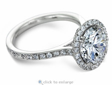 Fierra 2.5 carat round halo micro pave lab grown diamond look cubic zirconia engagement ring in platinum.