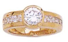 Layla 2 carat round bezel set lab grown diamond alternative cubic zirconia engagement ring in 14k yellow gold.
