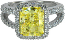 Carlton Emerald Radiant Cut 4 carat lab grown diamond alternative cubic zirconia pave halo split shank engagement ring in 14k white gold.