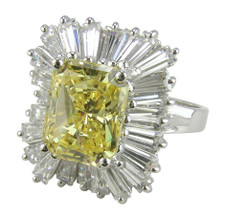Emerald radiant cut 4 carat lab grown diamond quality cubic zirconia baguette balerina cluster ring in 14k white gold.