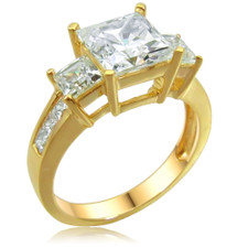 Winston three stone 1.5 carat princess cut laboratory grown diamond look cubic zirconia engagement ring in 14k yellow gold.