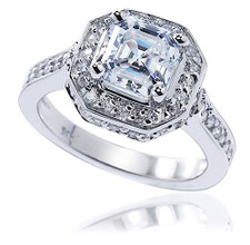 Elegant 2.5 carat asscher cut laboratory grown diamond look cubic zirconia cathedral halo pave set solitaire engagement ring in 14k white gold.