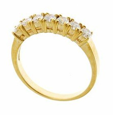 Irwin split prong round lab grown diamond simulant cubic zirconia anniversary band in 14k yellow gold.