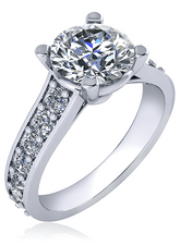 Round 2 Carat Four Prong Graduated Pave Cathedral Solitaire with lab grown diamond alternative cubic zirconia in 14k white gold.