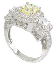 Kenton 1 carat princess cut lab grown diamond alternative cubic zirconia three stone halo ring in 14k white gold.