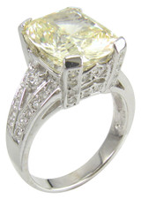Montibella 7 carat elongated cushion cut lab grown diamond alternative cubic zirconia pave engagement ring in 14k gold.