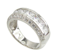 Channel set princess cut lab grown diamond simulant cubic zirconia pave set round anniversary band in 14k white gold. Channel set princess cut lab grown diamond simulant cubic zirconia pave set round anniversary band in 14k white gold.