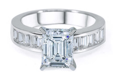 Emerald Step Cut 4 Carat Channel Set Baguette Solitaire with lab grown diamond look cubic zirconia in 14k white gold.