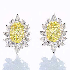 Oval 9 carat pear marquise cluster earrings with lab grown diamond look cubic zirconia in 14k white gold.