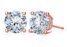 2 carat each round lab created diamond simulant cubic zirconia stud earrings in 14K rose gold with friction posts.
