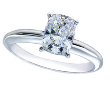 Elongated cushion cut lab grown diamond alternative cubic zirconia solitaire engagement ring in 14k white gold.