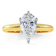 Pear shape lab grown diamond simulant cubic zirconia 6 prong classic solitaire engagement ring in 14k yellow gold.