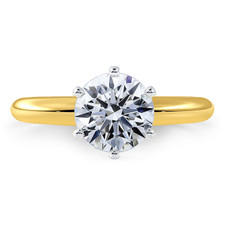 Round six prong lab grown diamond simulant cubic zirconia tiffany style solitaire engagement ring in 14k yellow gold.