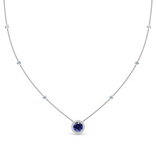 Elysian round man made sapphire halo station necklace with lab grown diamond look cubic zirconia in 14k white gold.