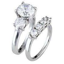 Three Stone Round 1 Carat Classic Bridal Set with simulated lab grown diamond quality cubic zirconia in 14k white gold.
