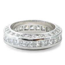 Channel set princess cut and pave set round lab grown diamond quality cubic zirconia eternity band in 14k white gold.