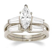 Marquise lab grown diamond look cubic zirconia baguette solitaire engagement ring with matching wedding band in 14k white gold.