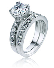 Round 1 Carat Pave Bridal Set with lab grown diamond look cubic zirconia in platinum. Round 1 Carat Pave Bridal Set with lab grown diamond look cubic zirconia in platinum.