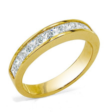 Kiran princess cut channel set laboratory grown diamond alternative cubic zirconia anniversary band in 14k yellow gold.