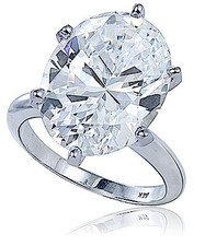 Viceroy 9 carat oval lab created cubic zirconia tiffany style classic solitaire in 14k white gold.