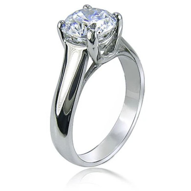 Luccia 2.5 Carat Round Trellis Setting Lab Grown Diamond Look Alternative Cubic Zirconia Solitaire Engagement Ring in 14k white and 14k yellow gold.