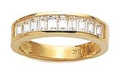 Channel set lab created cubic zirconia baguette anniversary wedding band in 14k yellow gold.