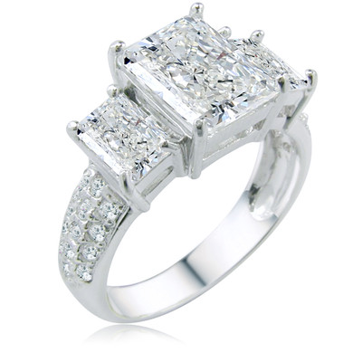 Three stone 2.5 carat emerald radiant cut lab grown diamond look cubic zirconia pave anniversary ring in 14k white gold.