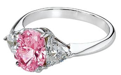 Legally Blonde 2 style 2.5 carat pink oval lab grown diamond alternative cubic zirconia trillion solitaire engagement ring in 14k white gold.
