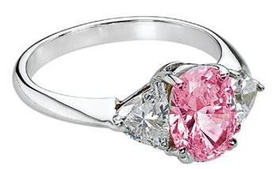 Legally Blonde 2 style 1 carat pink lab grown diamond simulant cubic zirconia trillion solitaire engagement ring in 14k white gold.