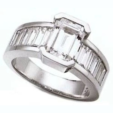 Emerald step cut 2.5 carat lab grown diamond alternative cubic zirconia baguette solitaire engagement ring in 14k white gold.