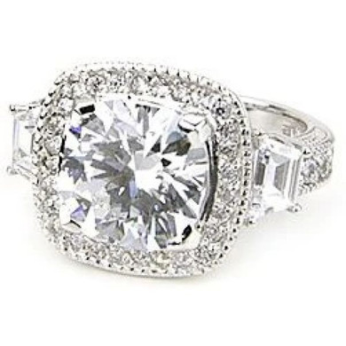 Lenova cushion cut lab created cubic zirconia halo ring with trapezoids set in platinum.