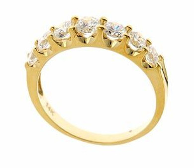 Electra graduated round lab grown diamond quality cubic zirconia prong set anniversary band in 14k yellow gold.