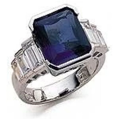 Man made sapphire 4 carat emerald cut engagement ring with graduated lab grown diamond alternative cubic zirconia baguettes in 14k white gold.