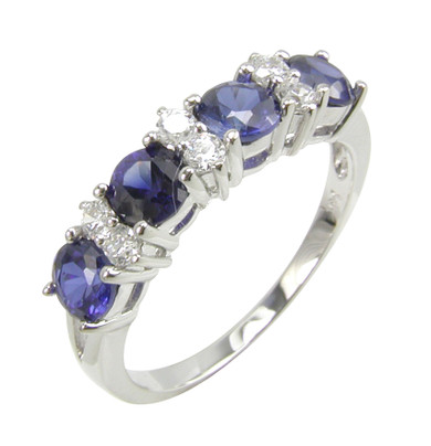 Daniella alternating man made sapphire and lab grown diamond look cubic zirconia round anniversary band in 14k white gold.