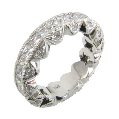 Channel set princess cut and prong set round lab created cubic zirconia designer eternity band in 14k white gold.