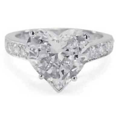 Heart 4 Carat Pave Cathedral Style Solitaire with lab grown diamond simulant cubic zirconia in 14k white gold.
