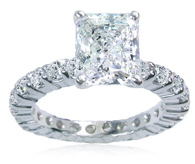 Emerald Radiant Cut 1.5 Carat Eternity Engagement Ring with laboratory grown diamond look cubic zirconia in 14k white gold.