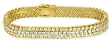 Kamaria Semi Bezel Shared Prong Round Bracelet with lab grown diamond quality cubic zirconia in 14k yellow gold.