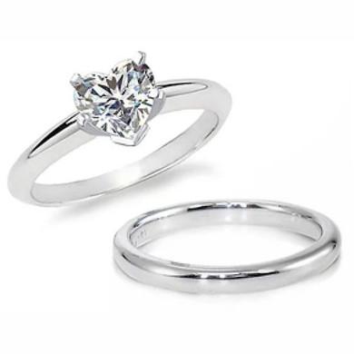 Heart shape lab grown diamond simulant cubic zirconia classic solitaire engagement ring with matching wedding band in 14k white gold.